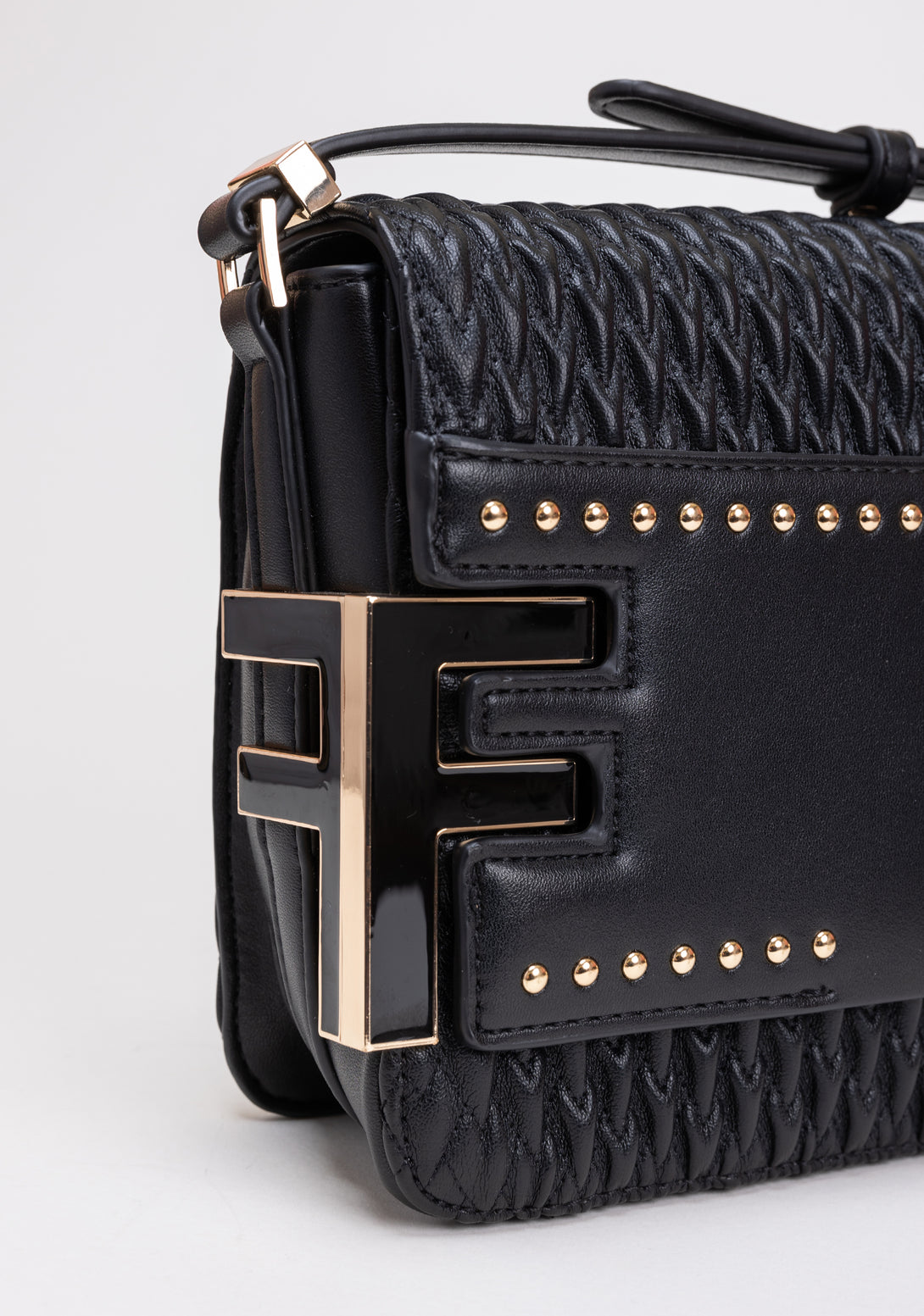 Bella bag made in embossed eco leather with studs