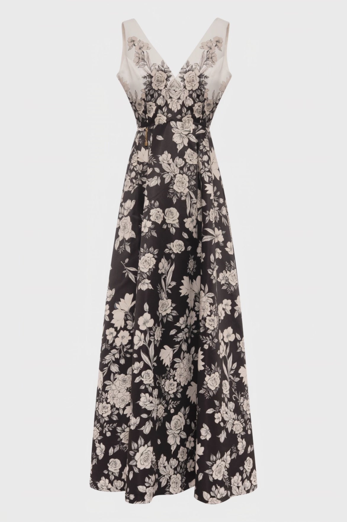 Long sleeveless dress with flowery pattern
