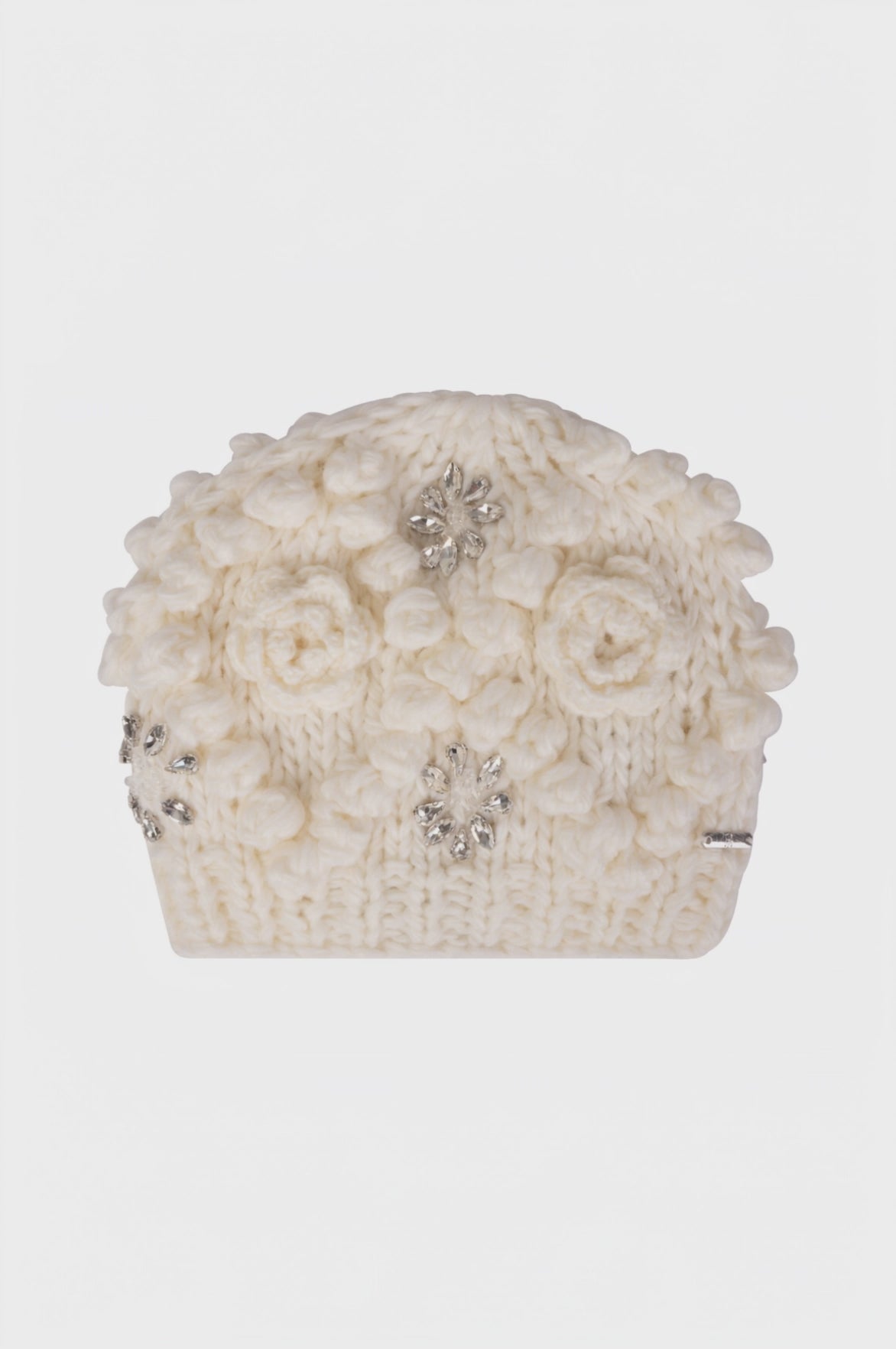 Knitted hat with flowers and jewelry applications