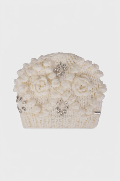 Knitted hat with flowers and jewelry applications